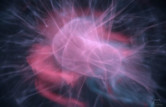 Kinetic shot of plasma ball with blue and pink electricity